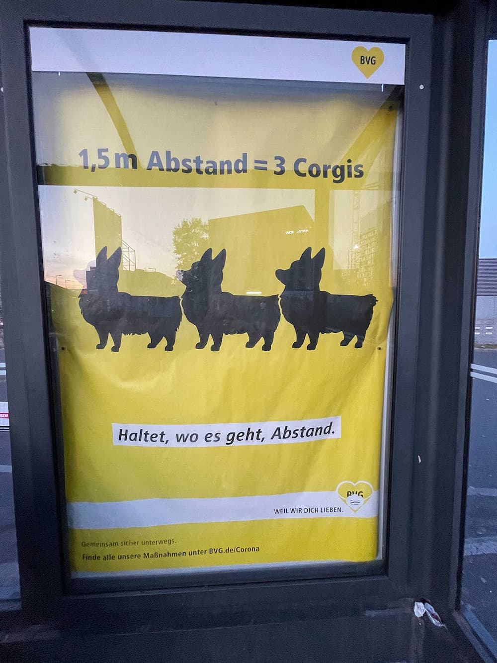 Picture of Social Distancing poster in a bus stop in Berlin